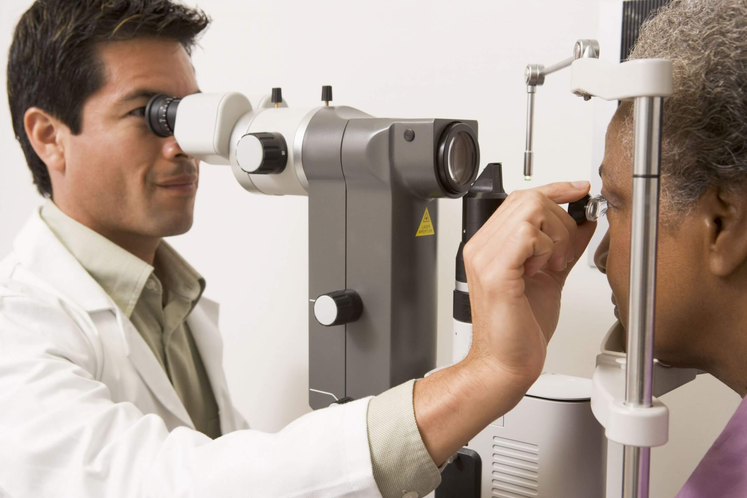 Optometrist performing and eye test